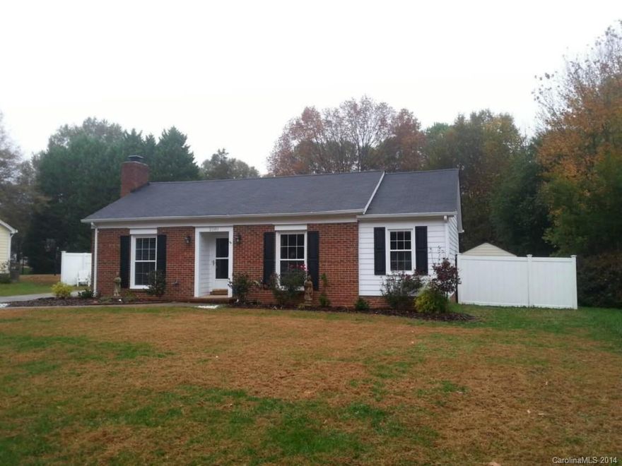 Charming 2 bedroom, 2 bath ranch home. Originally a 3 Bedroom home, seller took out partial wall to make bedroom larger with sitting area.  Wall can easily be replaced.   Updated kitchen with granite counters and decorative backsplash, new lighting, new windows, new paint, storm door, fenced in yard, decorative patio. Outdoor storage area also.  Convenient location to uptown, I485, Ballentyne and Southpark.  Very cute home on a huge fenced in lot.