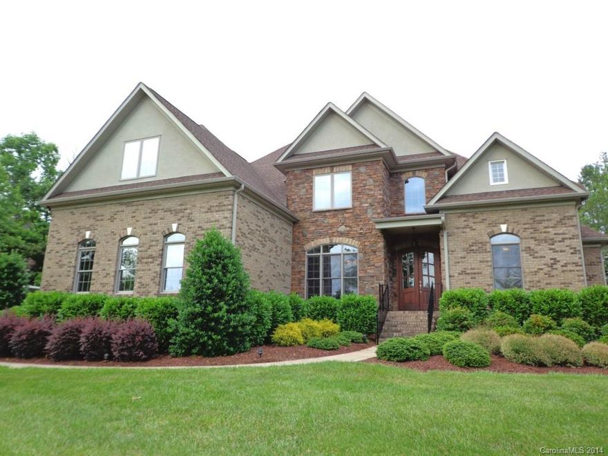 Welcome to Lake Wylie’s Carolina Coves, just 20 min. f/Charlotte, close to Lake Wylie access and activities.  This stately brick and stone beauty is special inside and out. From the wood floors, well appointed kitchen open to the great room, luxurious owner’s retreat and 2 fireplaces, to the stunning salt water pool with waterfall and iron fenced yard. Luxurious living with Clover Schools.