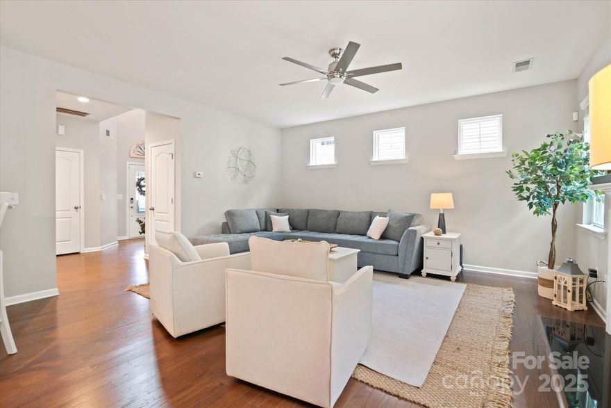 Beautiful 4BR/2.5BA home in sought-after Walnut Creek! Built in 2013, this move-in-ready home features wood floors, a gas fireplace, and abundant natural light. The kitchen boasts cream-colored 36” cabinets, granite counters, tile backsplash, and stainless appliances. Upstairs you'll find four bedrooms, including a spacious primary suite with two walk-in closets, garden tub, dual vanities, and walk-in shower. Main-level laundry, built-in garage storage, and a private patio with built-in grill add function and charm. Fully fenced backyard. Zoned for top-rated Indian Land schools and minutes from the new Costco, Super Target, dining, and medical. Enjoy community pool, clubhouse, playgrounds, and low HOA. Don't miss this truly move-in ready opportunity!