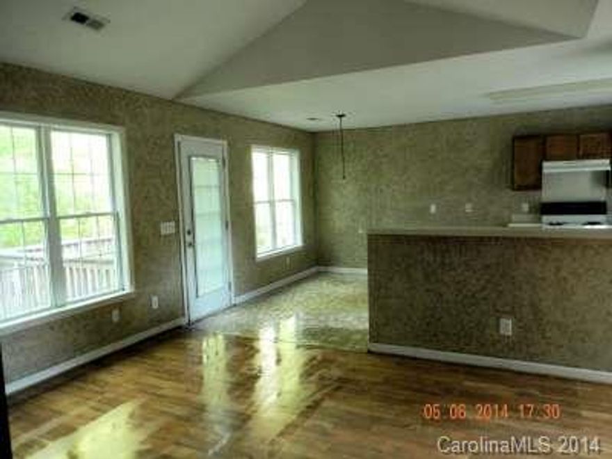 Newer home with 3bd/2ba.  New carpet.  .77 acre.  Property does NOT have a driveway.  Great investment potential.  PLEASE PARK IN CUL-DE-SAC.  Use the survey markers as a GUIDE when walking to the property.