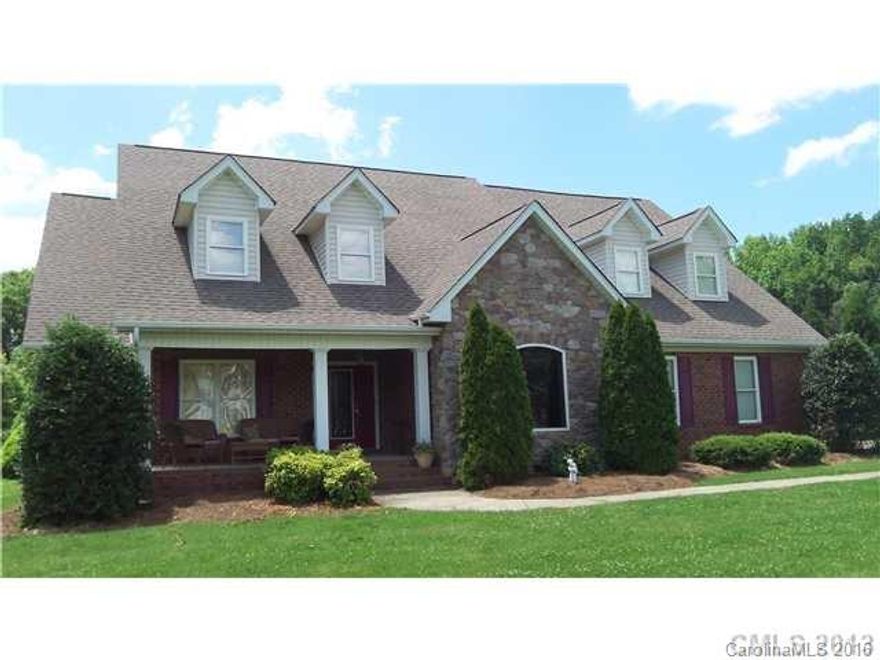 Well Appointed Breathtaking 4 Bed&Bonus Brick/Stone 1.5 Story Cape on manicured 1.98 AC just outside Mint Hill town & close to 485! Amazing custom features! Granite counter tops infused w/LED lights sparkle & add unique style! Split bed floor plan, open & bright, new expansive deck for entertaining, vaulted great room w/ stately gas stone fireplace,  spacious master suite, walk in closet, 2nd floor ENORMOUS bonus room for rec or media room! Elegant details throughout!