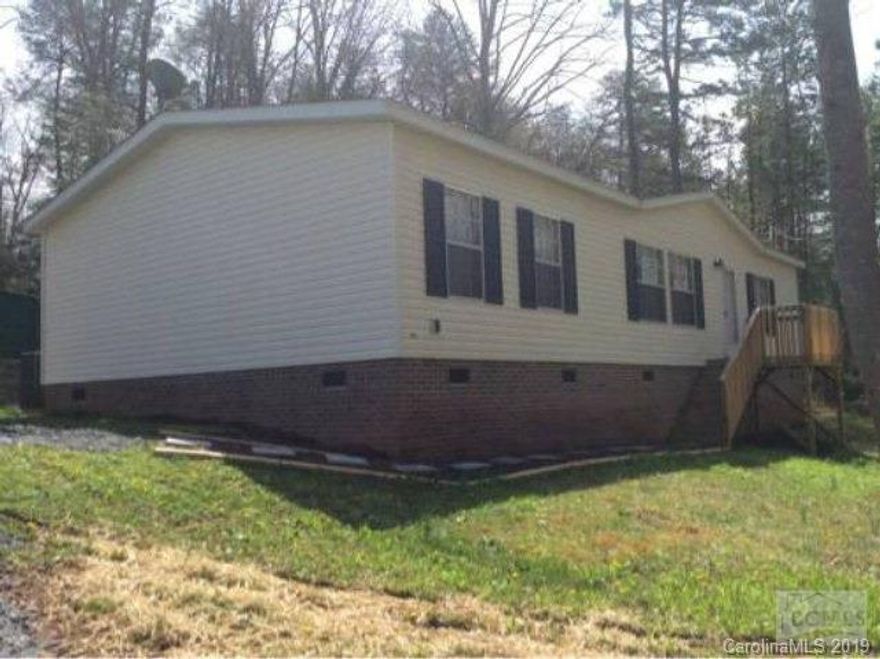 Very Nice 1400 Sq Ft 3BR 2BA Double Wide Brick underpinned Central Heat and Air Glamour Bath Garden Tub Separate Shower His and hers Vanity Generous amt of Cabinets T/O Walk in Closet New Carpet 2 out buildings Nice shady lot at end of street. Financing for lower scores requires 10% dn Better scores 5 %