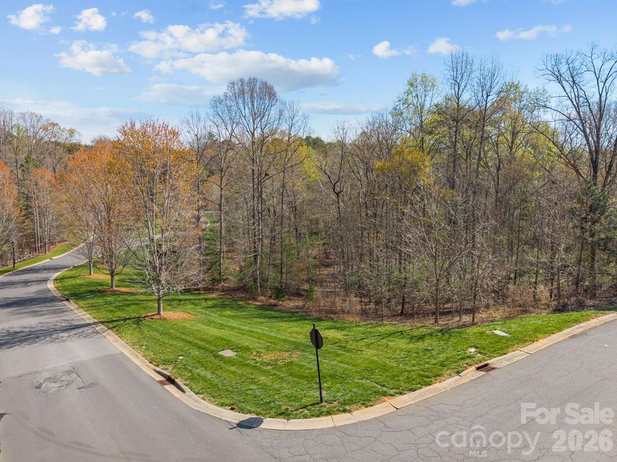 Build your dream home on this exceptional waterfront lot in the highly sought-after Reflection Pointe community. Nestled along the shores with serene water views, this property offers the perfect blend of privacy, natural beauty, and upscale living. Enjoy direct water access, kayaking, or simply relaxing by the shoreline.

Reflection Pointe is a premier gated community known for its resort-style amenities, including a clubhouse, pool, tennis courts, walking trails, and marina. With gently sloping terrain and ample space to design your custom home, this lot provides endless possibilities to create your own private retreat.