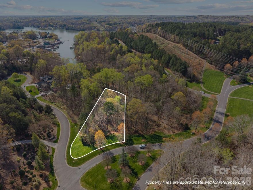 Build your dream home on this exceptional waterfront lot in the highly sought-after Reflection Pointe community. Nestled along the shores with serene water views, this property offers the perfect blend of privacy, natural beauty, and upscale living. Enjoy direct water access, kayaking, or simply relaxing by the shoreline.

Reflection Pointe is a premier gated community known for its resort-style amenities, including a clubhouse, pool, tennis courts, walking trails, and marina. With gently sloping terrain and ample space to design your custom home, this lot provides endless possibilities to create your own private retreat.