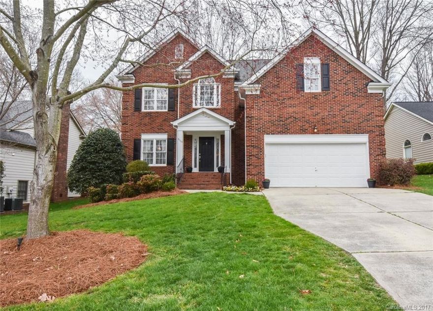 Beautiful full brick, Cameron Wood home that has been meticulously kept!  Lovely family room with new gas logs overlooks the deck. and large landscaped backyard. Three bedrooms w/bonus that could be fourth.  Master has a vaulted ceiling, huge closet, garden tub, & double vanity. New carpet, roof 2011, new granite, newer stove & dishwasher. 2-story 2 car garage with custom shelves. Irrigation & security system. Easy to show! PLEASE REMOVE SHOES.