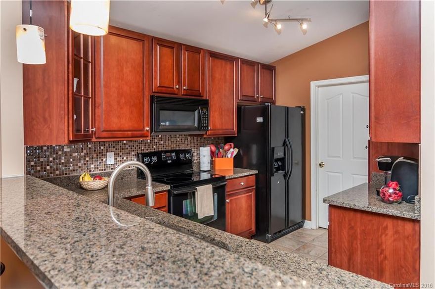 Come visit SPECTACULAR condo at Copper Ridge! RARE 2-CAR garage (only 4 of 320 units)! 
2 bed/2 full bath, PLUS 3rd room w/French Doors. NEW wood floors. NEW Granite, 42” cabinets, tiled back-splash & floor in kitchen. Spacious Master w/WIC Laundry off kitchen. Light, bright rooms. Vaulted ceiling, Pvt Balcony facies soon-to-bloom dogwood trees. Storage room off deck. New lighting too! Parking space closest to entry door. HOA fee incl Water/Sewer/Garbage. Sellers open to selling some furniture