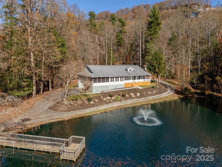 Down a Private Drive! You will find a large pond and a spacious home that is move-in ready! Enjoy the view from the rocking chair front porch with your morning coffee, plus fishing from your dock in your very own pond! This lovely home features a great room that is open to the kitchen that has granite counters, range with pot filler, and butler’s pantry with sink. Primary suite with updated bath that includes a spa shower and walk-in closet, and a room for study, office or music. The inviting screened porch overlooks the pond. A shed/storage building and a small greenhouse! 3.8 acres and just minutes to Historic Main St. and recreation!
