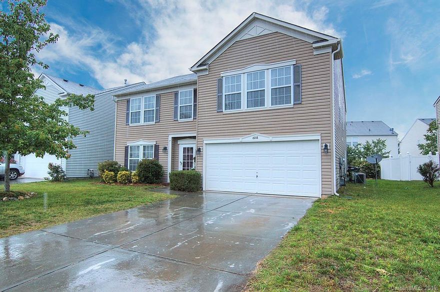 Gems like this one don't last long! Location! Location! Location! Conveniently located to I-77, Ballantyne, Pineville and Baxter Village. Fantastic schools. Low taxes. Brand new flooring throughout (hand scraped hickory laminate and carpeting) and paint top-to-bottom. New dishwasher and new master and guest bath fixtures. Motion sensored garage light. Fantastic community playground, two pools, clubhouse, access to greenway trails, walk to both Sugar Creek Elem. and Nation Ford High School.