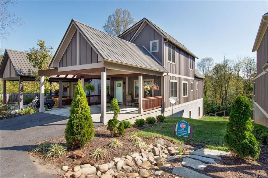 Beautiful contemporary West Asheville home just blocks from Sunny Point, Haywood Rd, and Carrier Park. This two-story home offers so many possible living situations!  Master on main, two more suites upstairs, each with a private bathroom. Fully soundproofed. Huge daylight basement with 11 foot ceilings is ready to be finished (plumbing already stubbed in) for fantastic in-law suite or possible Homestay. Modern open floor plan, granite countertops, large windows, and hardwood floors throughout.