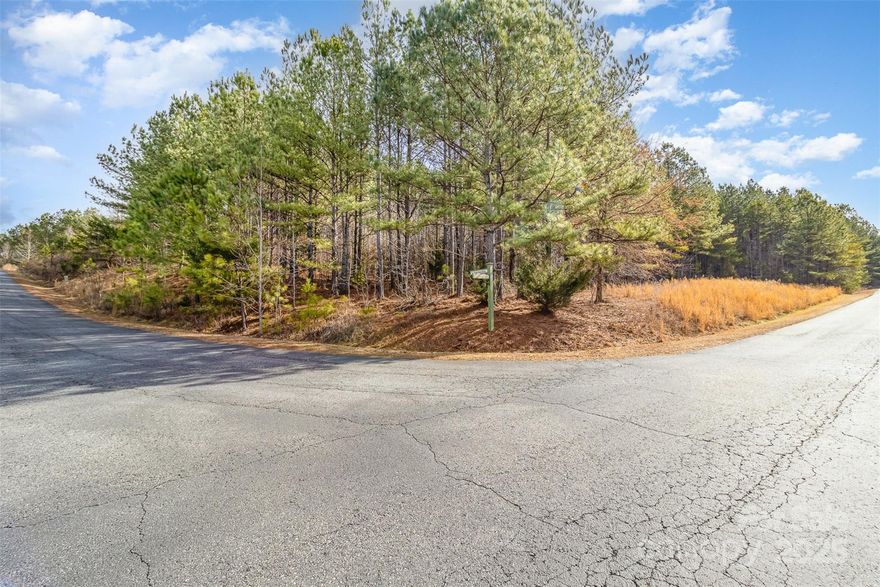 This beautiful, corner lot located in the gated community of Broad River Highlands is perfect for building your dream home. This lot is located just a 10-minute drive to Gardner-Webb University, a 15 minute drive to Gaffney, SC, and a 25 minute drive to Shelby. The School zone is for Crest. Custom built homes or State Certified Modulars are both allowed with a minimum square footage of 1000 square feet (No manufactured homes). RV's and campers are welcome on a temporary basis without permanent hookups. The community offers canoe/kayak launch access to Broad River, a walking trail, commons area by the Broad River with a covered picnic area. Additionally, underground electrical service has been installed. Buyer's Agent to verify all pertinent information for their client(s). This gorgeous property is priced to sell don't let it get away!!