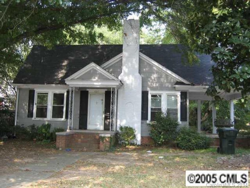 Tons of potential but needs lots of work.  Purchase AS IS - HVAC has been removed.  Side Porch.  Walk to DT.