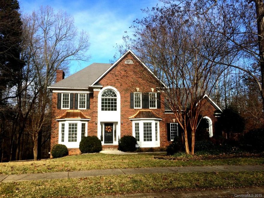 Have a family member who needs separate housing? Gorgeous updated & IMPECCABLY KEPT Full Brick 2 story Gem with lower level upscale apartment. Over 4000sf HLA- Formals and bright and cheery kitchen.  Hardwds through main level. Family room with built-ins and fireplace. Upper level hosts 4BRs and two baths. Apt includes super sz master,custom cabs in kitchen, Lg LR with FPL, 2 bths and study. Rail lift gets easy access to lowr level. Generous 3/4 acre private wooded lot. A must see, rare find...