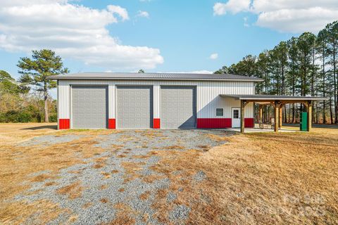 Photo of 510 Lillys Bridge Road, Mount Gilead, NC 27306 (MLS # 4326122)