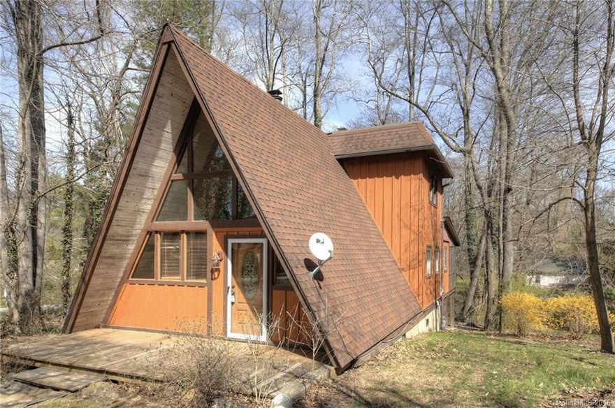 COZY SMALL CHALET. Very unique home features large living room with 1BR/1BA on 1st floor and 1BR/1BA on upper level. Large laundry room with lots of storage. Nice neighborhood.   City Water and Natural Gas. New septic to be installed.  Priced to Sell!