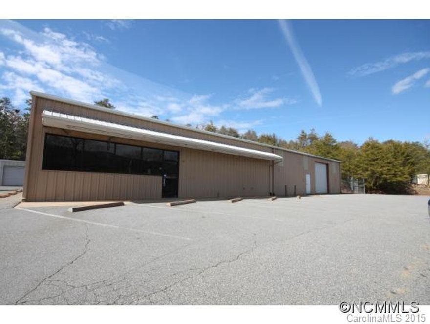 Great investment property near new growth in and around Weaverville. Visible from the interstate and located off the exit 17 cloverleaf. .81 ac. 4000sf  storefront and warehouse with 10 storage units.