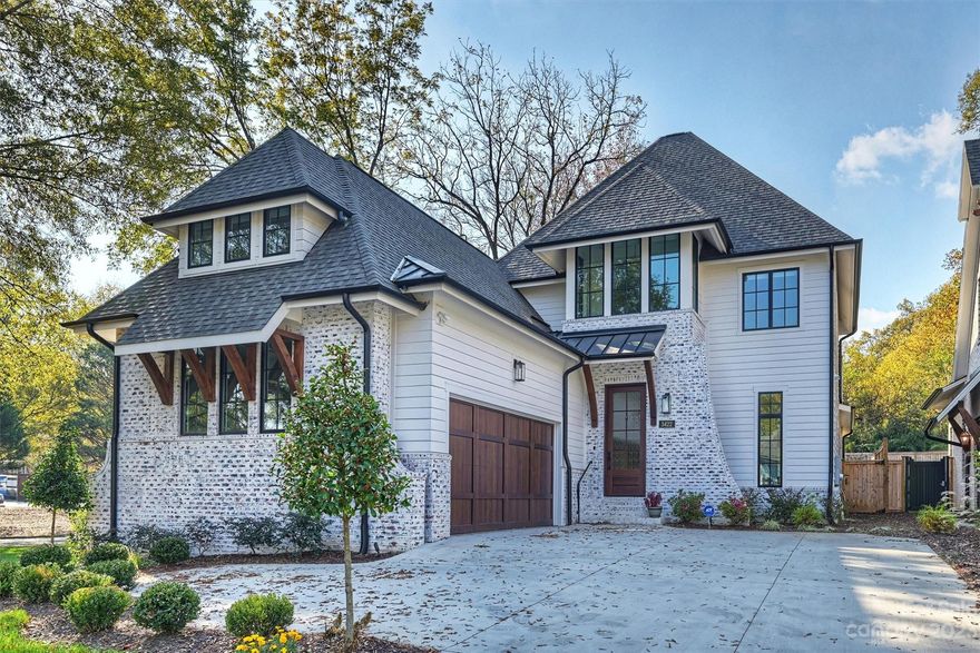 Opportunity for your buyer to own a virtually new Alenky Signature home in Myers Park. Welcoming foyer flows to a formal dining room that adjoins the kitchen thru butler's pantry with wine fridge & sink. Kitchen features custom cabinetry, quartz counters, 10’ long island, microwave drawer & under counter lighting. Thermador appliances incl 48” chef’s gas range, 2 dishwashers, built-in refrigerator/freezer and 2 refrigerator drawers all w/custom cabinet panels. Beautiful 7.5'' wide white oak floors on main and upper living. Gathering room features beamed ceiling, gas fpl & oversized accordion glass doors leading to covered porch w/fireplace and outdoor space. Owner’s Retreat on main level features luxury bath w/ walk-in closets, addt'l laundry and vaulted and beamed ceiling! Addt'l main level guest suite w/pvt bath & sep powder room. 3 BRs up each w/direct access to a bath. Addt'l large laundry w/built-ins & sink on upper. Bonus area w/reading nook. Recirculating tankless water heater!