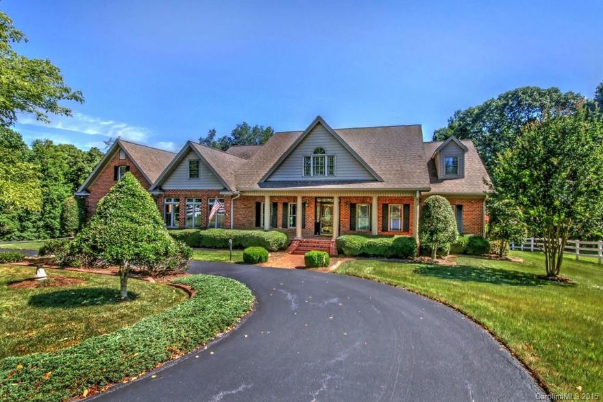 BRING YOUR HORSES to this amazing 7.9 acre getaway where you'll be surrounded by nature's beauty! Hardwoods throughout, Kit w/ granite, Formals, Library, Sunroom, Study & GR w/ gas log fireplace. Expansive Master Suite on main & upper level has 2 BR's & 1 BA. Unfin Bsmt for storage/workshop & workshop area above garage. Rocking Chair Front Porch & Rear Deck. Barn with lean to, 4 stalls, wash stall, hay storage and office/storage. Fenced pasture allows your horses to graze with confidence!