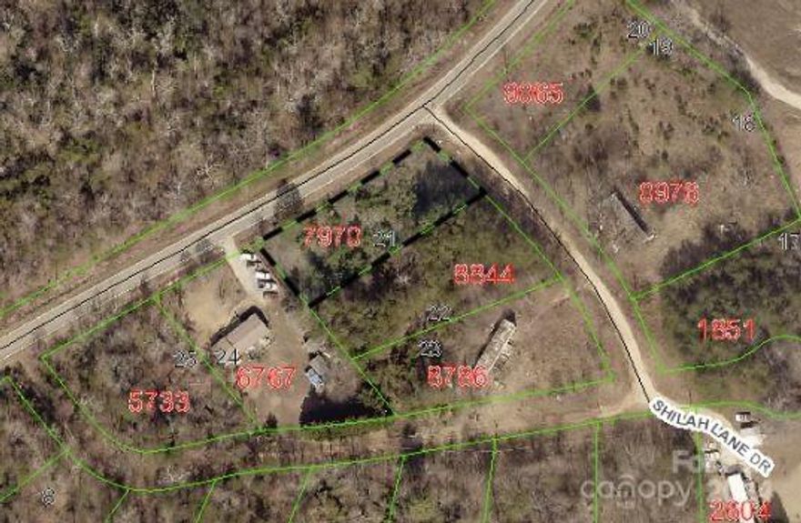 New listing  .50 off   a gravel road  a Level building lot  with mountain views.  Will allow  SW and DW homes and modular and site built home also.  Need well and septic (already  pre perked,  buyer will responsible  for final septic permit) on a paved road. located in Dyersville NC 1 mile from new Dollar General located on Hwy  226 .  Property has been off the market for years  new owners.  New road to be built in main part of Subdivision.  One  of 13 new lots ready to build on. This lot will be a corner lot Property owned by NC real estate agent