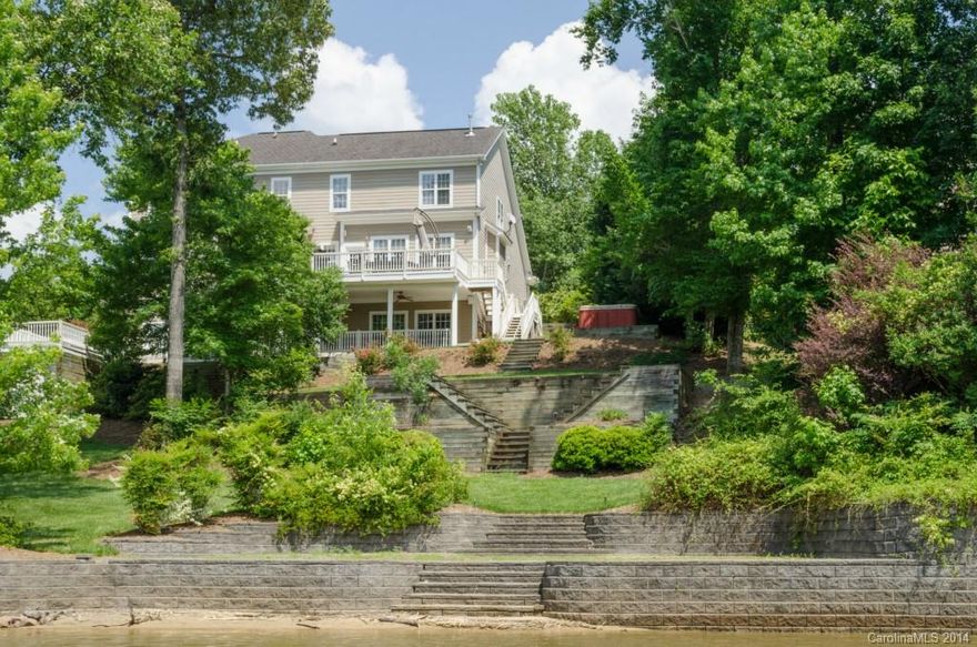 Waterfront living at it's finest, Lake views out almost every window. Enjoy sunsets right off your back deck every evening. Sauna & wine room within this Spacious Tega Cay home on beautifully landscaped waterfront lot, priced to sell. Walk right out to your boat dock and launch.