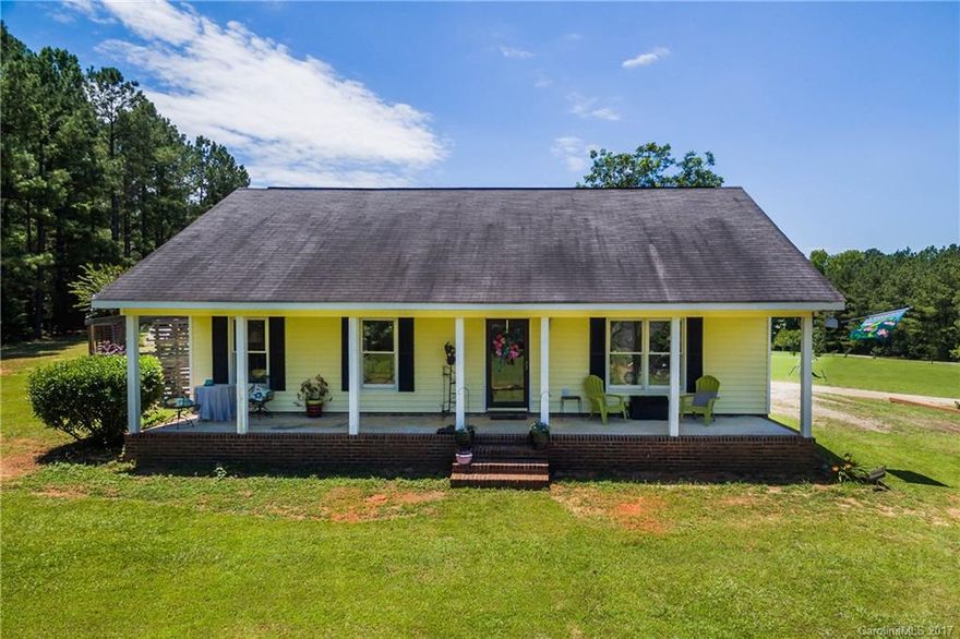 BACK ON THE MARKET!!! DON'T MISS IT THIS TIME AROUND!!
Charming 2 bedroom 1 bath home on 1.82 acres in a private setting.  Great front porch for enjoying evening breezes in your own private hideaway!  Home has newer laminate flooring in living areas for easy cleaning.  You won't want to miss this one, come on out and see it today!