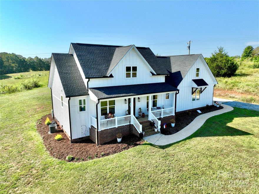 Set on 10.26 unrestricted acres, this newly built 2023 home offers a rare combination of modern comfort, thoughtful design, and versatile land use. With 3 bedrooms, 3 full bathrooms, and a spacious bonus room, the residence balances open living spaces with plenty of private retreats—ideal for families, hobbyists, or anyone who values both comfort and functionality.
The home’s clean, contemporary style reflects quality construction and attention to detail. Large windows invite natural light throughout the main living areas, framing peaceful views of the surrounding acreage. The bonus room offers flexibility—perfect for a home office, media room, or guest space—while the open floor plan encourages easy everyday living and entertaining.
Beyond the home itself, the property’s 10.26 acres create room to expand, garden, raise animals, or simply enjoy the outdoors. A shed on the property adds convenient storage for equipment or supplies. The land is serviced by two county water hookups, and includes a well with a cattle watering system that has not been used by the current owner—ready for future agricultural or livestock needs.
Because the property is unrestricted, it’s free from HOA limitations, allowing new owners to shape the land and home to their preferences—whether for recreation, hobby farming, or other pursuits.  
This property blends the peace and space of rural living with the practicality of a modern home. With its flexible acreage, upgraded utilities, and no restrictions, it’s an ideal fit for those seeking both comfort and opportunity in a countryside setting.