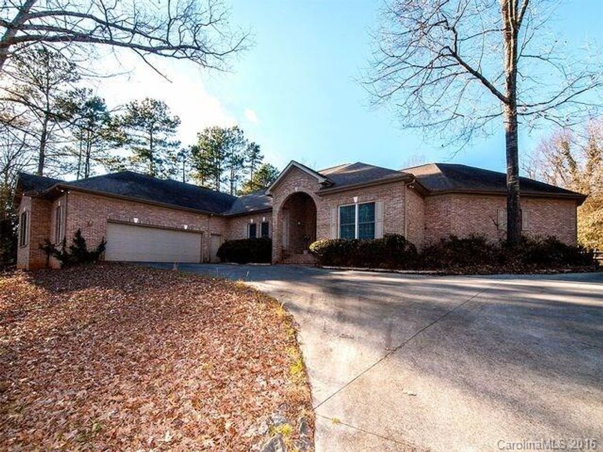 Beautiful, captivating custom built solid brick single story home on a private 1 acre wooded lot where an oasis awaits! Imagine warm summer evenings on your poolside veranda entertaining family and friends with cook outs, or relaxing in the pool! This spectacular home has private baths in three of its bedrooms, Special features include 4th bedroom/office, Tiled bathrooms, an oversized two car garage, abundance of storage, luxurious master suite with entrance to pool! Convenient to Charlotte!