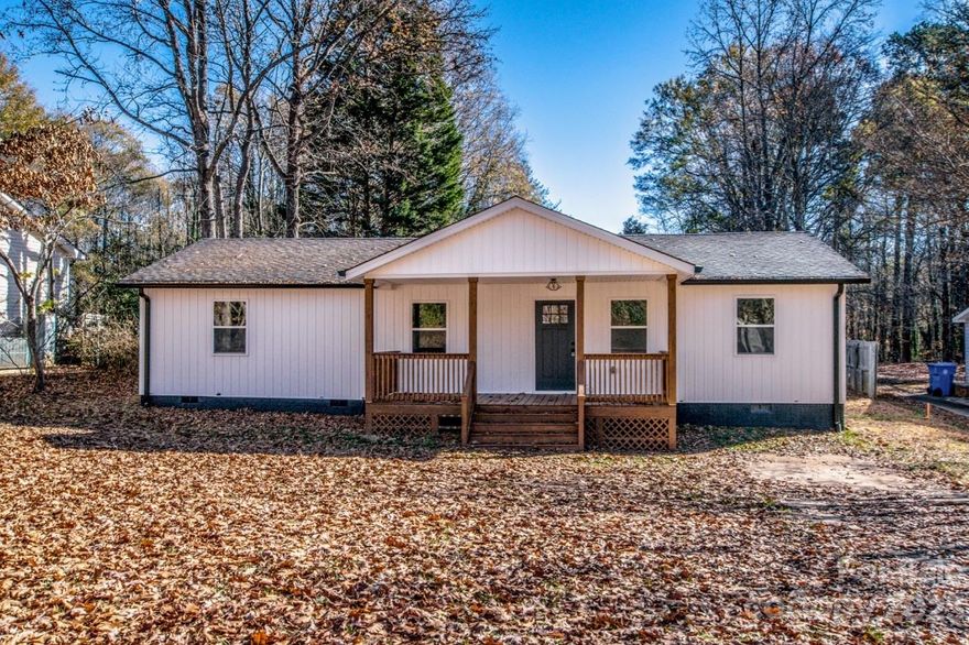 Exceptional Opportunity in Downtown Mooresville! Updated 3 Bed, 2 Bath Gem on Nearly Half an Acre! This property is a rare find, Step inside to discover a fresh and contemporary living space, highlighted by luxurious vinyl flooring that flows seamlessly throughout the home.  
The kitchen shines with quartz countertops, a stylish tile backsplash, and brand-new cabinets. Equipped with modern light fixtures and state-of-the-art appliances, this kitchen is a chef's delight.
Three cozy bedrooms provide ample space for relaxation and rest, complemented by two well-appointed bathrooms. Experience the best of downtown living with easy access to a plethora of shopping destinations and amenities that Mooresville has to offer.