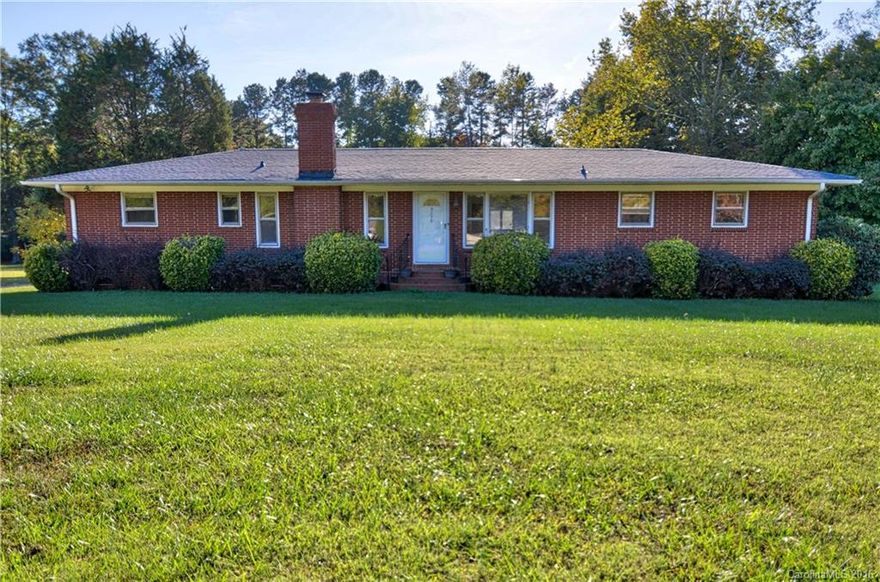 Hard to find full brick ranch w/open floor plan. Quiet & peaceful location. Wonderful brick fireplace w/woodstove. Large recreation room w/many use possibilities. Hardwoods recently refinished. Huge private yard w/spacious storage building & mature landscaping.
