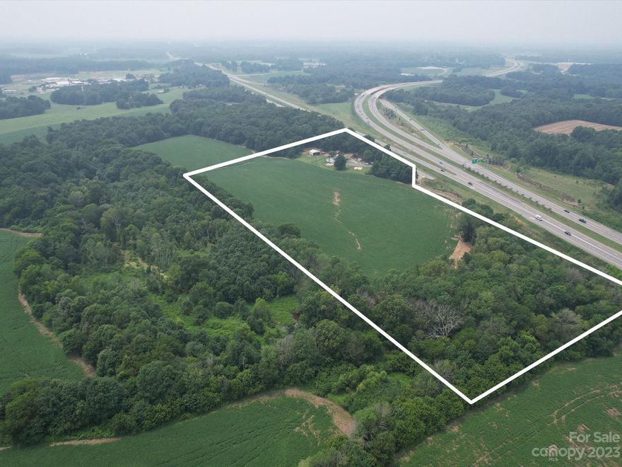 PRIME LOCATION Income Producing Property On The Eastern Side Of Union County! 14.65 +/- acres located on service road along Hwy 74 directly in front of the exit ramp at the end of the Monroe Expressway. Located in the ETJ of Marshville & zoned C-74 (US 74 Commercial) allows a variety of highway-oriented commercial activities & uses. Tenant occupied, 3 BR/1 BA, currently leased until August 2024. Do Not Disturb Tenants Or Enter Driveway. Income potential from billboard located at the eastern end of the property. Land is currently farmed generating annual income. Ideal location & only minutes to Wingate University. Creek borders property, portion located in floodplain. Potential sewer plans to the area anticipated in the next several years, portion of property verbally identified as a potential location. Reach out to Marshville PW for more info. https://www.marshville.org/sites/g/files/vyhlif6096/f/uploads/marshville_-_article_8_-_table_of_uses_-_table_8.1_-_section_1_-_general_uses.pdf