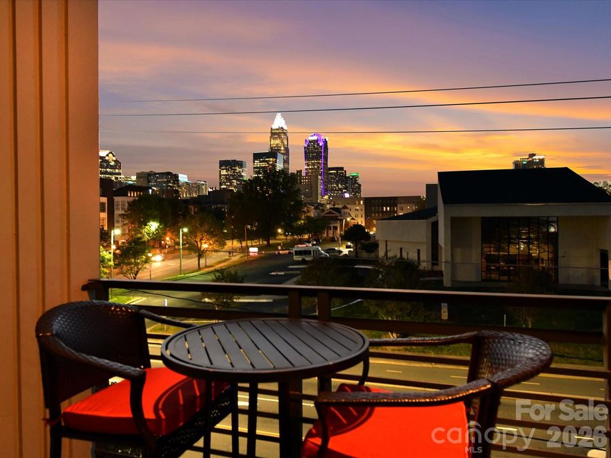 Experience Uptown living with stunning skyline views in the M Street Condominium community on N. McDowell Street. This stylish condo that could be sold fully furnished offers a flexible layout and low-maintenance living in a prime Charlotte location. The main entry level features a spacious bedroom, a full tiled bath and a den or office that works well for guests, remote work or added living space. Upstairs, the open floor plan is filled with natural light and designed for easy everyday living and entertaining. The kitchen features quartz countertops, tile backsplash, white cabinetry, stainless steel appliances and a center island with seating. It opens to the dining area and large living room, where windows frame beautiful skyline views. The third level is home to the private primary suite, complete with a well-appointed bath featuring a seamless glass shower, dual vanity and a stackable washer and dryer tucked into the bathroom closet for convenience. Step outside to your private balcony and take in amazing views of the Charlotte skyline. The basement level includes a one-car garage with direct access to the upper levels along with one additional assigned parking space.