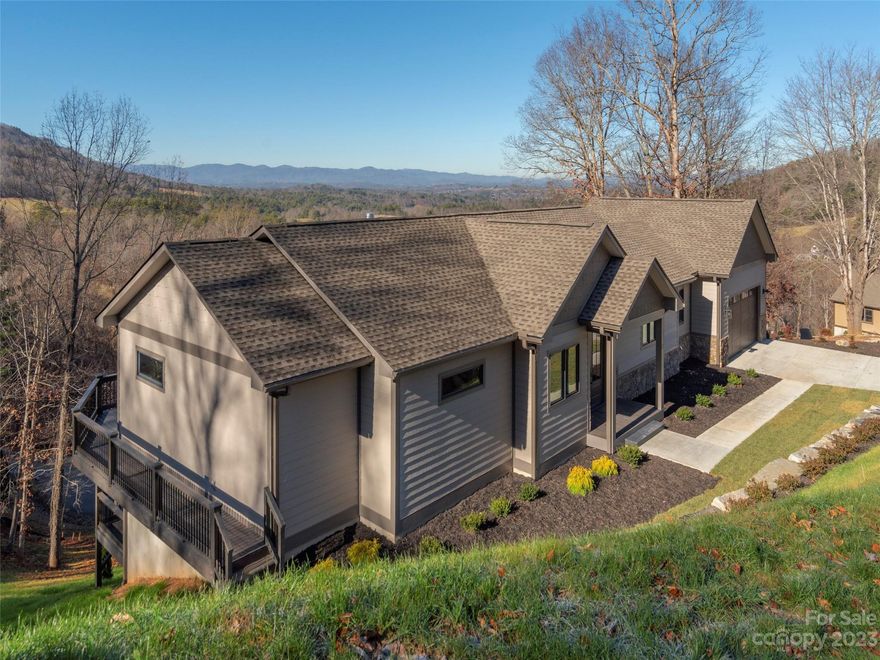 HIGH SPEED INTERNET & JAW DROPPING VIEWS! In beautiful Herron Cove Heights, a high-end  mountain community less than 10 min to Weaverville & Asheville! This BRAND NEW CUSTOM HOME is finished and ready for  its new, discerning owners. Extraordinary outdoor living with a screened porch, as well as upper and lower decks that run the length of the house facing views that will make you forget the world. High quality features throughout, solid white oak floors, 3 ensuite bedrooms, a 1/2 bath on each floor, generous bonus space which would allow  for 2 home offices or theater room or? Did I mention HIGH SPEED INTERNET & JAW DROPPING VIEWS?