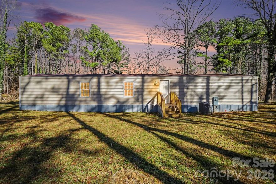 Welcome to this beautifully updated 3-bedroom, 1-bath single-wide manufactured home, offering modern upgrades and a comfortable living space. Recent improvements include new flooring, updated kitchen cabinetry, fresh tile, stylish light fixtures, and a freshly painted interior throughout.
Enjoy outdoor living with brand-new decks at both the front and rear entrances, perfect for relaxing or entertaining. A brand-new metal roof has also been recently installed, adding durability, energy efficiency, and long-term value.
Situated on a spacious 0.56, acre lot surrounded by mature trees, this property provides added privacy and a peaceful, serene setting.

Don’t miss this great opportunity to own a move-in ready home with charm and updates!