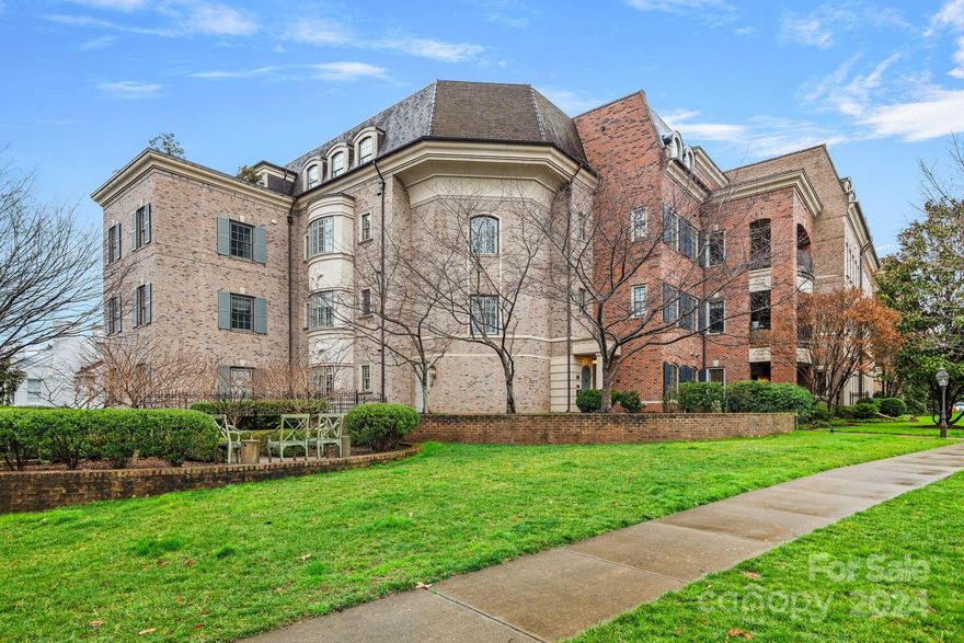 Rare opportunity to be part of one of Eastover's most desirable buildings, with your own front door! Beautiful first floor property provides easy access for guests. Pet owners will love the convenience of being able to quickly walk outside, without hallways or elevators. This unit also has its own beautifully landscaped patio beyond covered porch. Secure parking is below the building, w/elevator and hallway access to the interior door to this unit. Inside you will find high ceilings, an open floor plan, and ample space for a full dining room plus a breakfast/game table. The primary suite has his & hers walk-in closets, and plumbing remains intact for a bathtub where sellers chose to install additional cabinetry. The kitchen features a gorgeous island with walnut countertop, and a bar/butlery area adjoining. Full laundry room with terrific storage. 3rd bedroom currently used as office. Walk to shops & restaurants. This home and building exude elegance, and will be a pleasure to show.