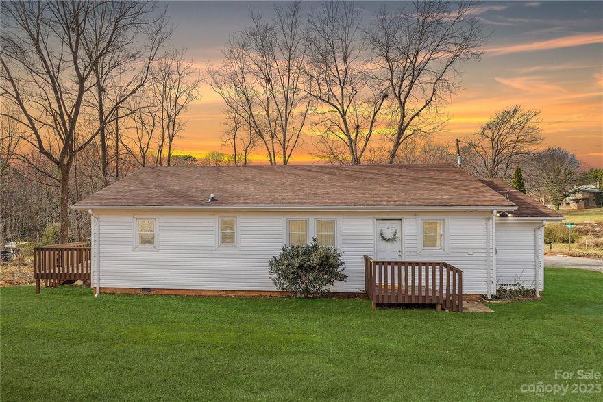 Explore the epitome of elegance in this versatile home, offering dual master suites with private en suite bathrooms. Designed for flexibility, it can easily convert into a four-bedroom haven. The property features separate living areas, a shared family room, a modern kitchen, and a dining room ideal for gatherings. Enjoy the outdoors on a spacious deck and large yard. Perfect for those seeking privacy, comfort and adaptability in their dream home.