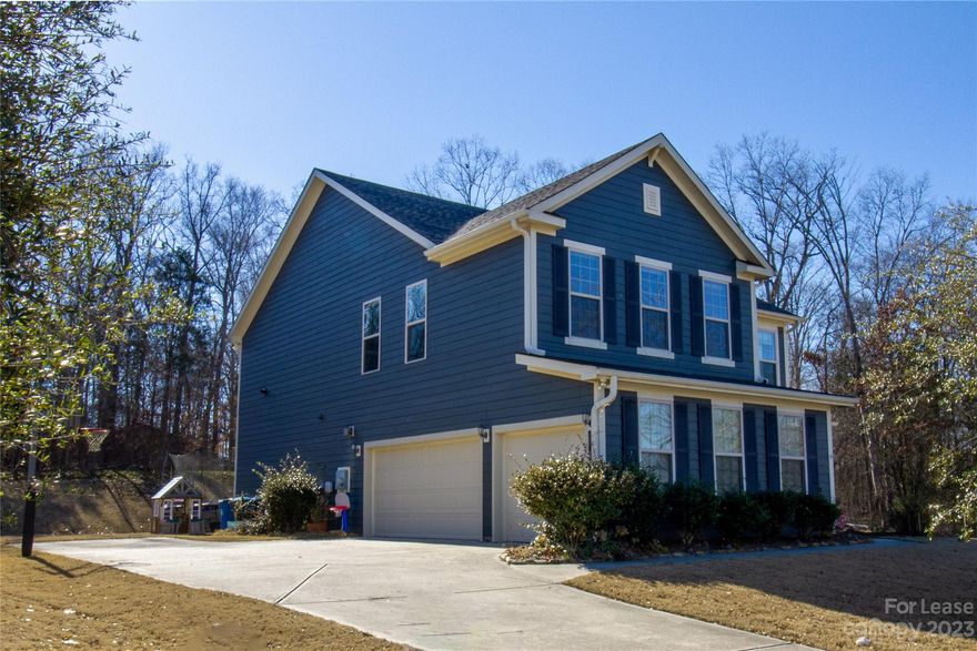 Serene Setting For A Beautiful Home, yet 5 min. to everything you need! Trees to the right, back and the community pool and playground is right across the street. Lovely landscaping, front porch and a 3 car Garage too! Main floor offers Dining Room with tray ceiling, Kitchen with large wonderful island, gas cooktop, double wall ovens, SS appliances, and light filled Breakfast area. Open to Family Room with built-in bookcases surrounding a gas fireplace. Bedroom and Full Bath on main also. Upper floor offers a large Loft/Bonus room, Primary bedroom with gorgeous ensuite Bath & walk-in closet. 3 more Bedrooms - all with walk-in closets - and 2 more Full Baths. Backyard has an oversized enclosed patio and backs to trees. Energy efficient, quiet and close access to I-485! Energy Star qualified Home!