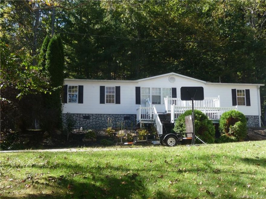 Very nice, move in ready 2/2 mfg. home. Affordable living, only 10 minutes to Asheville. Adjoining property #29 Speckled Hen also for sale. Wonderful investment property. Live in one and rent the other.