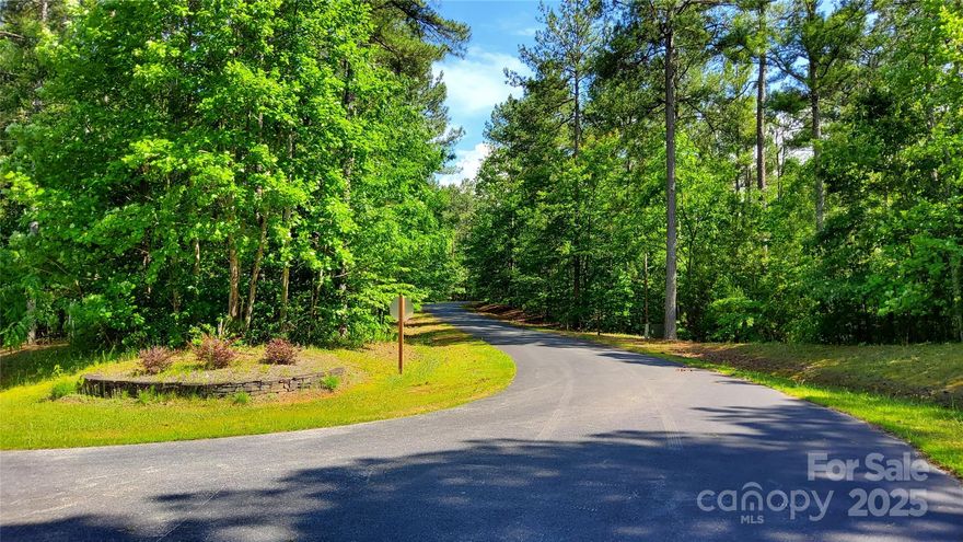 THREE PREMIUM BUILDING LOTS OF 5 PLUS ACRES in Ridgeview Subdivision in the Foothills of North Carolina.  Property is  level & would be so easy to excavate for a home in a lovely wooded/country subdivision of tall pines & hard woods on a private street. Total acreage is 5.93 acres.  Property is only 3 miles from Ingles Grocery Store/Gas station.  No steep curvy mountain roads to navigate here. This area is called the ISOTHERMAL BELT & is a zone in western NC foothills w/milder temperatures contributing to longer growing seasons than in the immediate surrounding region. The phenomenon usually occurs on the southern slopes of mountains & foothills protected from frost & freezing temperatures by higher mountains to the North & Northwest.  Enjoy summertime outdoor activities close by such as hiking, golfing, swimming, kayaking, horse-back riding & zip-lining.  The Tryon International Equestrian Center is a 20 min drive for equine enthusiasts.  Ideal location of a fulltime or vacation home.