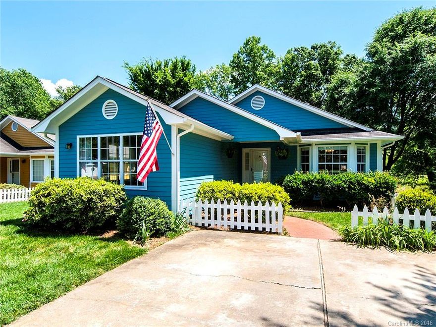 One level living in this private, quiet Ft. Mill setting! Convenient to Hwys, shopping & medical facilities, this charming & spacious home offers 4 BR's or 3 BR & huge den w/ half bath & walk-in closet. The fabulous sunroom will captivate you and the lower level workshop is sure to please anyone who has a hobby needing space! Suitable for woodworking, art studio, gardening or exercise space.  Updated kitchen appliances all remain. Fireplace is gas but convertible to wood burning. Ample storage!