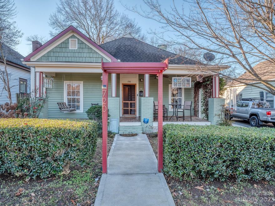Cool meets historic in this unique 1.5-story home in the heart of NoDa! You'll be greeted by a sweeping front porch and a living room that wows. You'll love the vaulted ceilings, original hardwood floors, and double-sided brick fireplace. The recently refreshed kitchen includes timeless navy cabinetry, a walk-in pantry, and new quartz countertops. Two generously sized bedrooms share a jack-and-jill bathroom on the main level, while two additional primary suite options offer maximum flexibility. The main-level primary bedroom with dual closets makes for a lovely retreat and the lofted bedroom upstairs boasts a walk-in closet and spacious en-suite bath. Outside, relax on the stone patio that leads directly to the guest house. This added area is a rare find and offers endless options. It's not insulated or permanently heated, but has tons of potential. Be sure not to miss the 4-car garage with loads of storage. Walk to all NoDa has to offer and enjoy easy access to all of Charlotte!