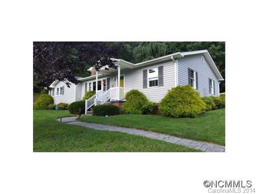 3BD/2BA w/plush wood flooring in all rooms except kitchen & bathroom which have tile. Lrg living room w/FP, knock down ceilings & unbelievable views from lrg picture window. Ready to move into. Home is full of warmth & a sense of comfort. Heat pump w/air, 3 bonus closets. Plus stamped concrete sidewalk, patio & driveway. Single car attached garage. Fenced in yard w/several types of mature trees. Close to rec park, Downtown, schools and shopping.