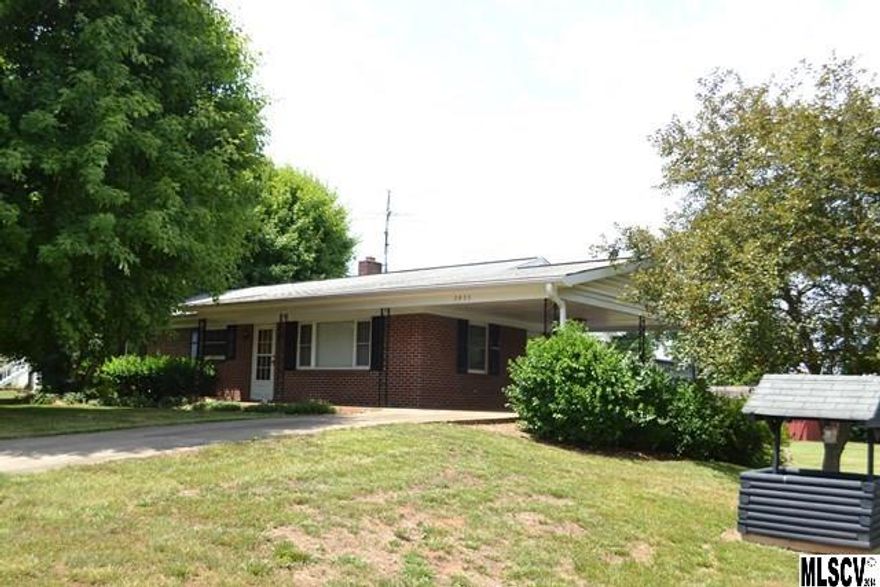 USDA Eligible according to the maps! Close to town and move in ready! Brick ranch w/full basement, 2.07 acres which includes lot beside the home, two stall barn, separate storage bldg,  Beautiful hardwood floors & tile, no carpet! Updated kitchen w/oak cabinets custom built by Precision Cabinetry featuring pull outs in lower cabinets and pantry, tile floor, fresh paint throughout, laundry moved upstairs to the smallest bedroom but could be moved back to basement, full basement has tons of storage space or use as your workshop, single garage in basement, very private setting back from the road and an extra large lot to spread out and play! Rock on the front porch or relax on the side deck. Total tax value of $135,800 includes extra lot!