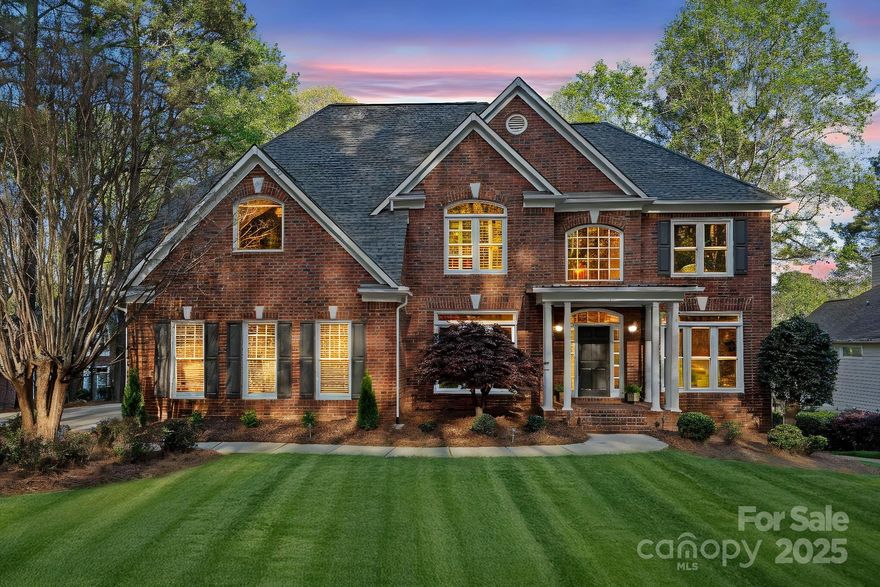 Experience elevated lakefront living in this stunning 3-level home on Lake Norman in the prestigious Harbour at The Pointe. This 5-bed, 5-bath home offers gorgeous lake views, a private dock w/gazebo, and fenced rear yard ready for a pool. The grand two-story foyer, extensive molding and fresh paint throughout create an inviting, tranquil atmosphere. The refreshed kitchen offers new lighting, a stylish backsplash, double oven, and large island that flows into a Great Room with floor to ceiling windows and lake views. A sunroom and deck provide seamless indoor-outdoor living. The main level includes a guest suite with full bath while upstairs the primary suite is a true retreat. The remodeled Jack-and-Jill bath was designed w/ a vintage modern aesthetic with storage and dual vanities. The lake level offers many possibilities with a kitchen, rec room, family room, flex space, full bath, and storage. With a NEW roof, NEW windows and freshly painted exterior, this home is sure to impress!