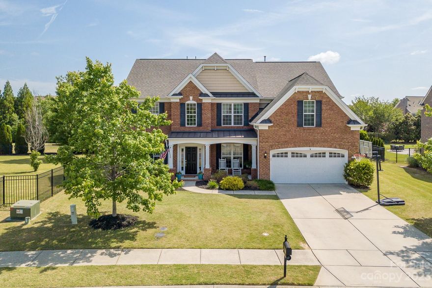 Beautiful 5 bedroom/4 bath Edinburgh floorplan in the popular Chimneys of Marvin community.  A bright 2 story foyer welcomes you to this open floorplan. Great layout with a designated office space with glass doors and full guest bedroom/bath on the main level. The Great Room has lots of natural light, a fireplace, and coffered ceiling detail.  Gourmet Kitchen with white cabinets, gas range, and granite tops.
Step into the fully fenced flat backyard with privacy trees that offers space for many options- perfect for entertaining!
Upstairs has a spacious owner suite with additional sitting area.   Down the hall are 3 other bedrooms, plus a bonus room space with built ins. Resort like living w/amenities including large outdoor pool, tennis courts, basketball, clubhouse, fitness center, and scenic pond.