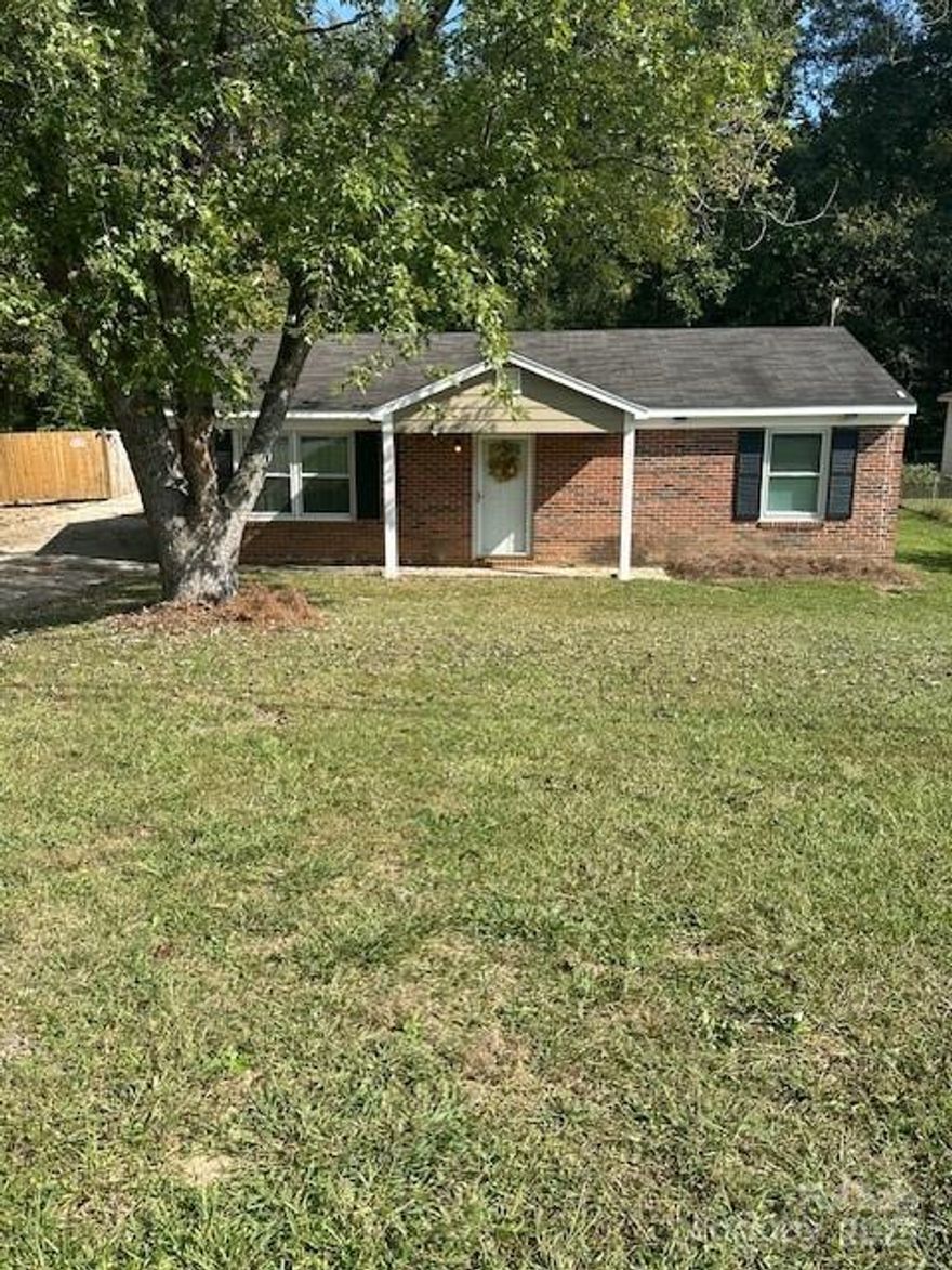 WELCOME to this tasteful, cozy 3br/1ba ranch home on .35 ac lot. Ideal for an investor to possibly have 2 rental income investments (one with existing home and one w/a roughed in detached garage; could be made into a small apt like living area) see agent remarks for more details on garage renovation. New windows throughout entire home! Newly constructed covered front porch, new vinyl on left exterior gable, newly painted soffit, high seer heat pump approx 10 years old or less, new 200 amp box installed, water heater is only approx 7 months old, copper plumbing was replaced with PEX under slab. A great plus is home is on CITY WATER!!! Septic w/lines/tank in back yard. All appl's will convey, to include refrig w/ice maker, microwave, range/oven, and dishwasher.  Wood privacy fence on each side of home. (2) VACANT LOTS AVAILABLE FOR PURCHASE DIRECTLY BESIDE THIS HOME OWNED BY SAME SELLER! (.39/.40 ac) Please call listing agent for details on the lots!  Please see Professional Measurements/Sketches that are in attachments which include the detached garage area along with the home. This is truly a unique situation for an investor or a family member to make the detached garage/apt to-be another means of living quarters!