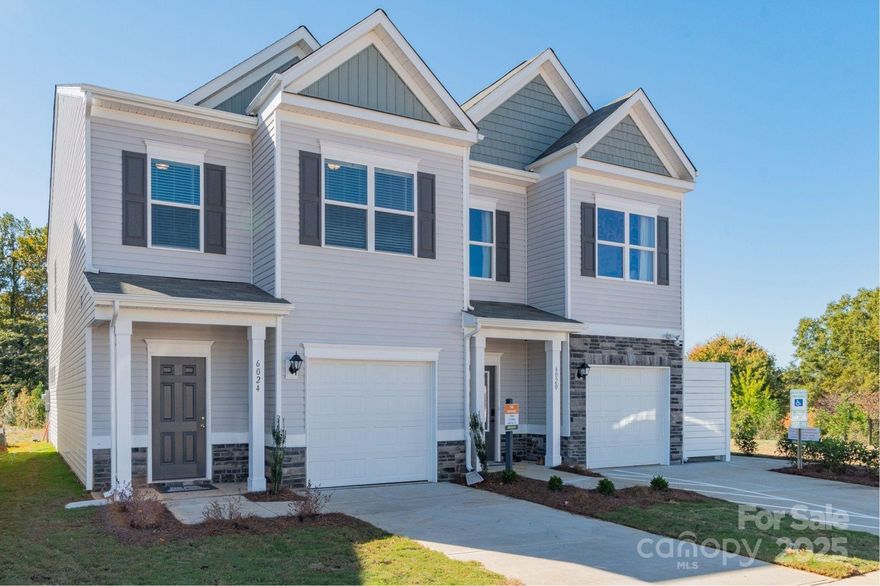 The Suwanee floorplan at Hickory Glen combines thoughtful design with low-maintenance living—just a short 10-minute drive from vibrant Uptown Charlotte. The floorplan features 1,629 sq ft with 3 bedrooms and 2.5 bathrooms. The kitchen offers 36" cabinets, quartz countertops, a large island, stainless steel appliances, and a generous pantry. The open-concept floorplan leads into the family room and dining area. Upgraded vinyl plank flooring throughout the first floor.

On the second floor, the primary suite features double marble vanities, a walk-in closet, and a large tile shower. Two additional bedrooms, a hall bath, and a laundry room are also found upstairs.  Blinds are included throughout. Located on the very end in the cul-de-sac, this is a prime homesite. Hickory Glen also features duplex-style townhomes, with only 2 units per building, for added privacy and natural light.