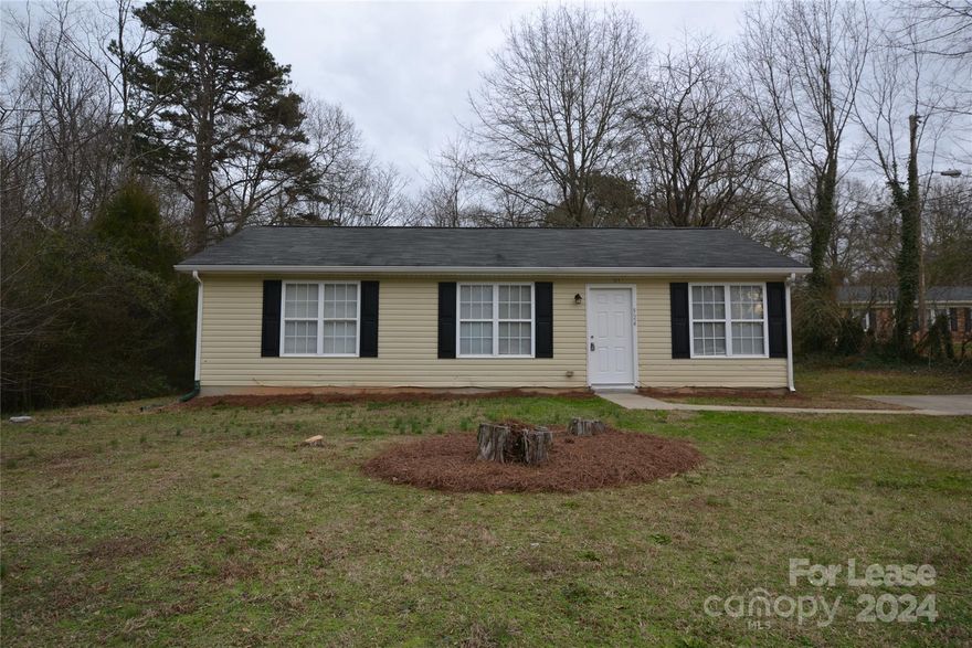 Cute Home in convenient location with laminate hardwood floors, Kitchen has stainless steal stove and fridge. Home features a living room in the center of the home with the master suite located on one side and the secondary bedrooms are on the other side of the house. Large eat in kitchen with access to the back yard. Master suite is a good size with a private bathroom. Relax in the back yard that is surrounded by mature trees.