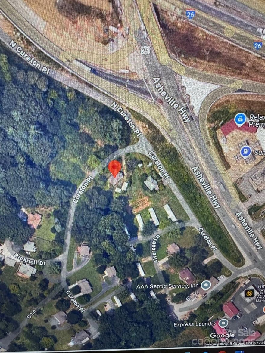 0.69 Acre Lot, Zoned RC, typically allows for a mix of residential and commercial uses, making it quite versatile. Located right off the I-26 Corridor, Exit 44 Naples and Fletcher Exit. Given the proximity to fast food franchises and unique places like Sheetz, Shell Truck Stop and numerous other businesses, would make the property benefit from high traffic and visibility. City Water, Sewer, and Electrical. Old house on property and storage building. House is not listed as any value. 
Would be a great location for small retail shops, such as a bakery, coffee shop, storage units, boutique, attracting both locals and visitors. Could be a fit for Professionals, Accountants, Lawyers, Real Estate agents.
One of the fastest growing areas in Henderson County. Numerous housing developments, New Ingles, and so much more growth going on in this area, makes these type properties harder and harder to locate.