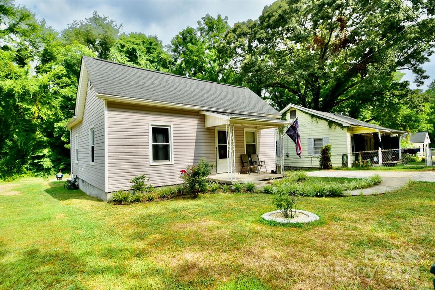 Come see this cozy 2-bedroom 1-bath bungalow located in west Gastonia near exit 14 off I-85. This home has a newer roof, vinyl siding, eat-in kitchen with stainless steel appliances, and bathroom with ceramic tile flooring and tub surround. The tub has a sliding glass shower door. Outside is a large backyard deck, a large shed, and private garden. There is also plenty of space in the backyard to play, entertain, or simply relax. With the rising costs of living, this home presents a cost effective alternative to high rents and mortgages. Something to consider before the opportunity gets away…