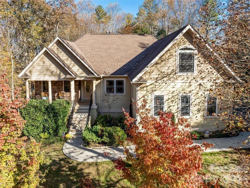 Now repositioned at a compelling value and returned to market through no fault of the property, 40 Mountain Shadows Drive represents a limited opportunity to secure a refined mountain residence just minutes from downtown Asheville.
Privately set within an enclave of established homes, this Mountain View estate offers a rare blend of quiet seclusion and immediate access to Asheville’s acclaimed dining, boutique shopping, and premier medical facilities, an increasingly hard-to-find combination in today’s market.
Inside, soaring ceilings, natural light, and timeless architectural elements create an atmosphere of understated sophistication. The open, flowing design is both functional and elegant, with a well-appointed gourmet kitchen seamlessly connecting to expansive living and dining spaces designed for elevated entertaining and effortless daily living.
The main-level primary suite provides a true sense of retreat, while additional guest accommodations offer comfort and flexibility. Upstairs, a spacious en-suite layout with walk-in closet adapts beautifully as a secondary primary, executive office, or private lounge. Two substantial attic spaces, including one partially finished, present future potential rarely available in homes of this caliber.
The walk-out lower level further distinguishes the home, featuring a generous family room, vented gas fireplace, full bath, kitchenette, and additional flex rooms, ideal for extended stays, recreation, renting or multi-generational living.
Outdoors, curated spaces invite both quiet mornings and refined gatherings, with covered porches, a scenic patio, and manicured grounds that embrace the surrounding landscape. Dual oversized garages with dedicated workshop space add a level of utility seldom found in similarly located properties. Two wood-burning fireplaces complete the home’s warm, mountain ambiance.
Opportunities offering this level of privacy, scale, and proximity to Asheville are increasingly limited, making this a compelling consideration for buyers seeking both lifestyle and long-term value. 
-Explore 40 Mtn Shadows from the comfort of your couch, all open houses are currently virtual! Prefer a private, in-person experience? Reach out to the listing agent to schedule your personal tour.