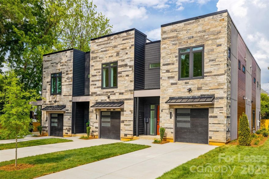 Luxurious end unit townhome located in the heart of SouthPark - stroll to your favorite shops & restaurants in just minutes! The open floor plan showcases the white oak flooring & the 10 ft ceilings highlight the natural light pouring in. The chef's kitchen is a true standout, featuring stunning beige cabinetry, open shelving, 9'-foot island w/ quartz countertops, SS appliances (hello double oven!), endless cabinet & countertop storage AND a walk-in pantry. Another bonus? The accompanying dry bar area, complete with a wine fridge, cabinet storage & walnut shelving, perfect for hosting/entertaining! Moving into your open concept dining area/living room space, you'll find a beautiful electric fireplace, & doors leading you out back, where you'll enjoy dining al-fresco under your covered porch that is completed by the fenced in back yard. The lavish primary suite is accompanied by your spa-like en-suite bathroom + large walk-in closet. Also upstairs are your loft area/ flex space + 2 more additional bedrooms.